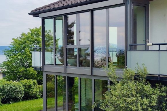 Création d'une extension entièrement vitrée sur deux niveaux avec une magnifique vue sur le lac Léman (74)