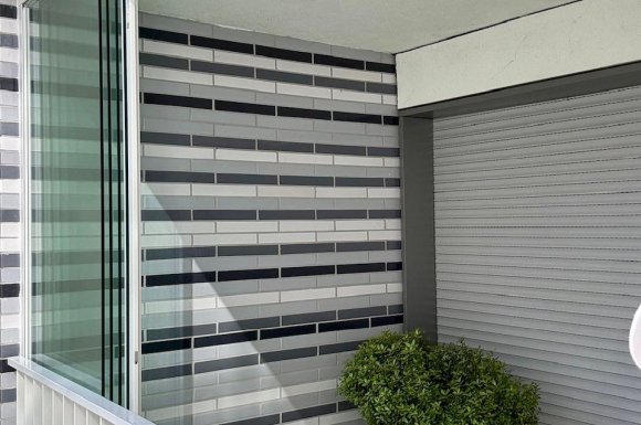 Fermeture de terrasse avec système coulissant tout verre : profiter de sa terrasse plus longtemps à Lyon!