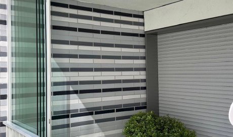 Fermeture de terrasse avec système coulissant tout verre : profiter de sa terrasse plus longtemps à Lyon!