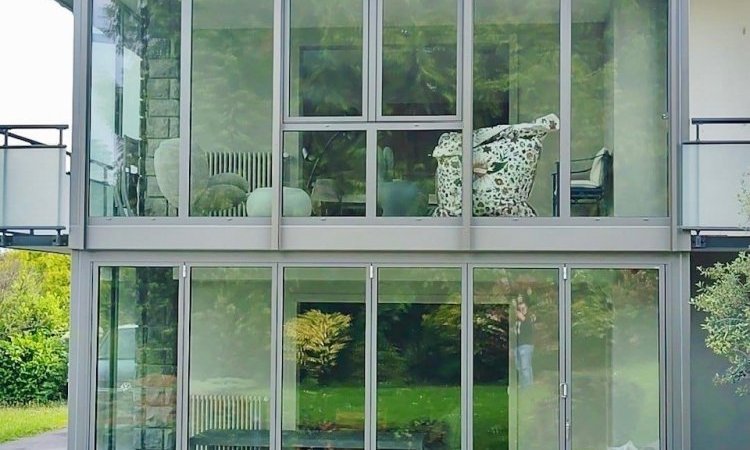 Pose d'une baie accordéon dans une villa près du lac Léman (74) 